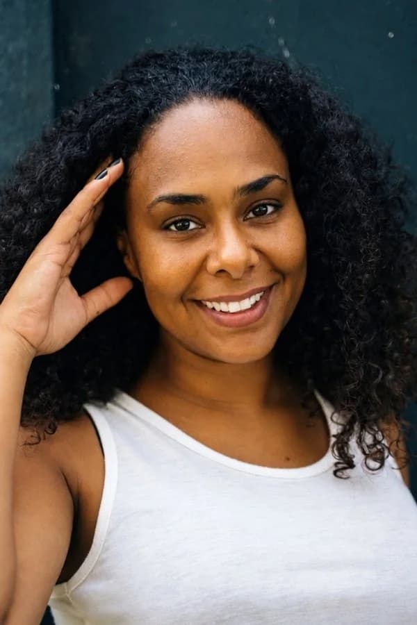 The same woman with open brown eyes looking at the camera
