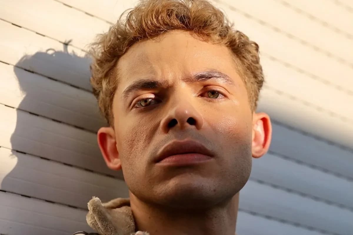 The same man with his face evenly lit
