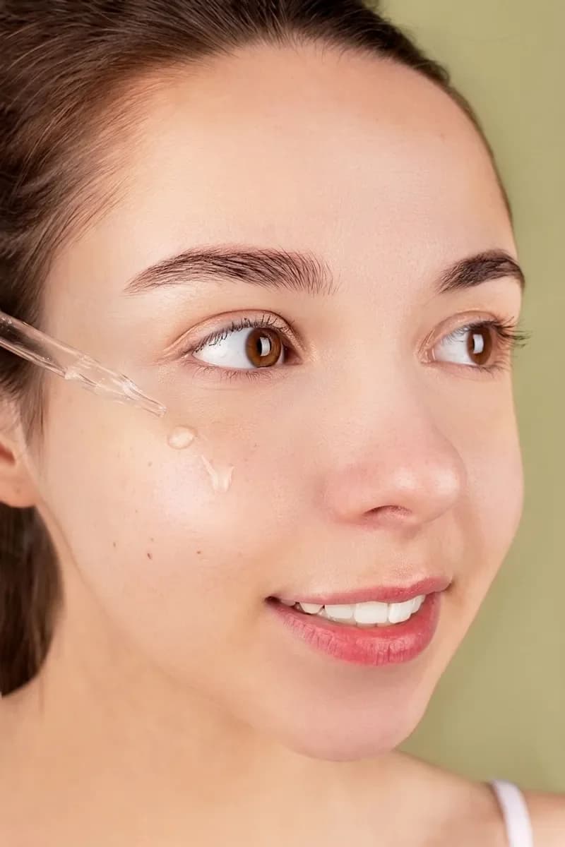 The same woman with clear, even skin