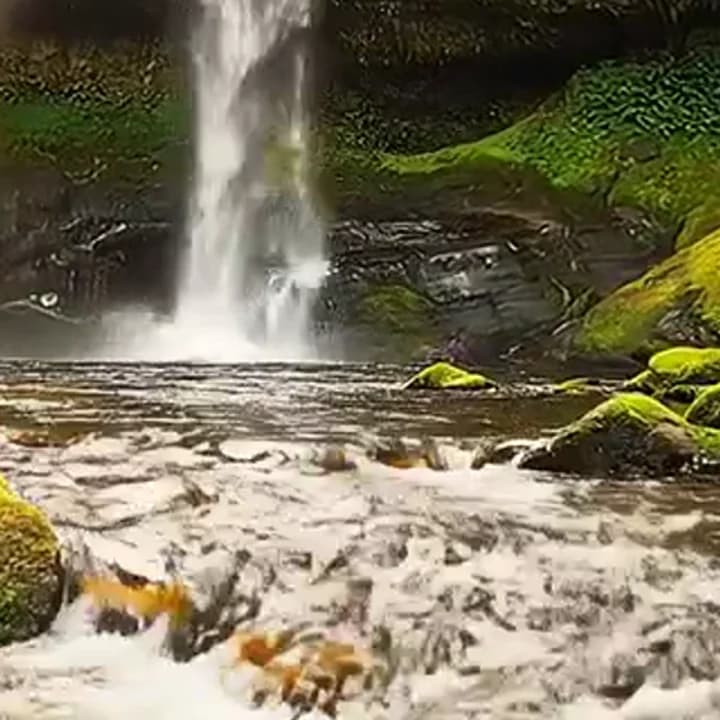 The same crop after the Telegram preset: the waterfall and rocks are sharp, the spray slightly softer