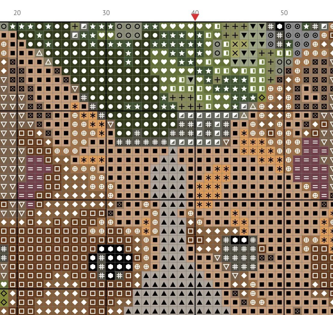 Section of a chart page: the corgi's head in colored squares with symbols, a 10-square grid and column numbers